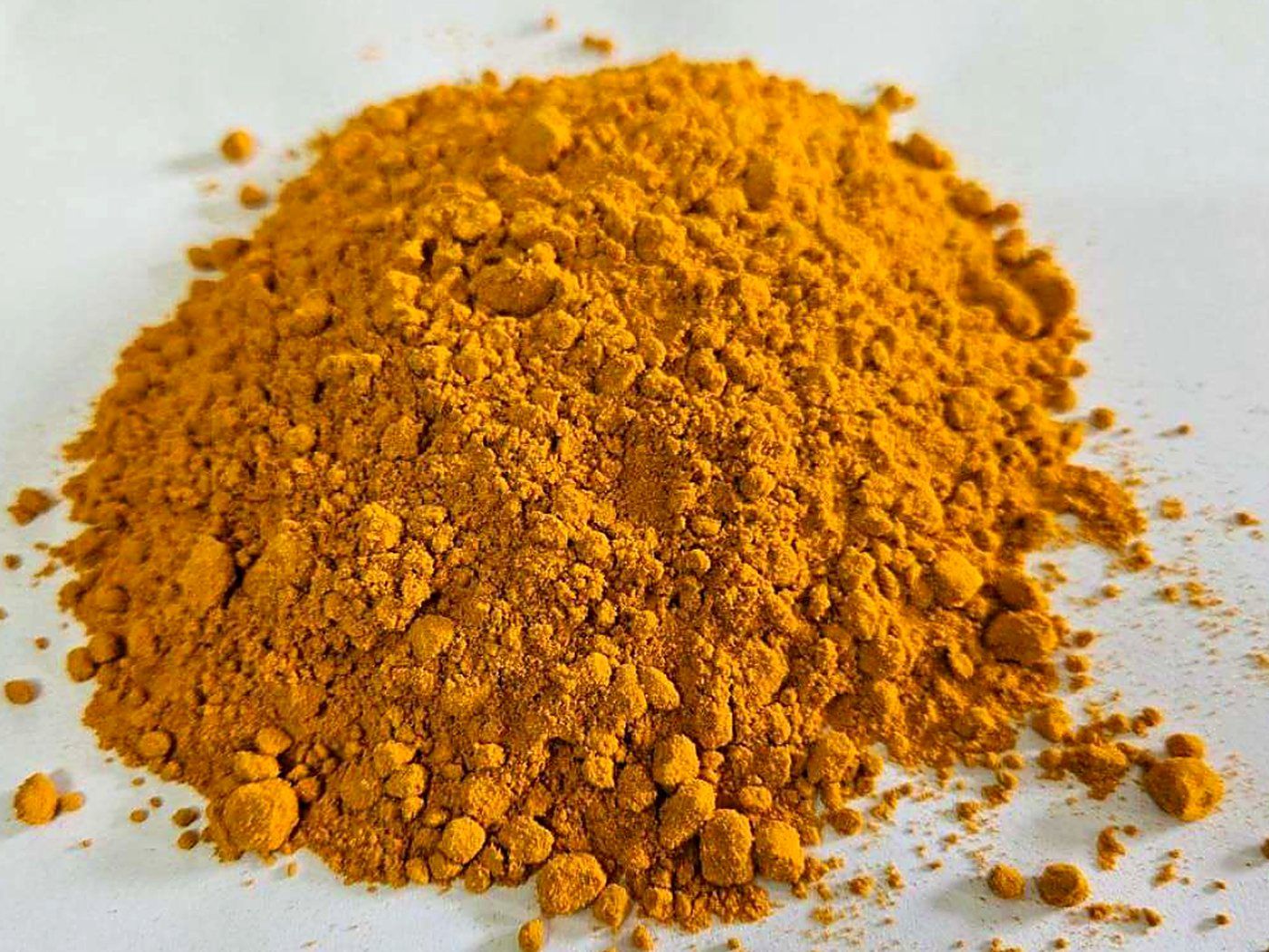 Bright golden turmeric powder milled by MKB Enterprises on its dedicated turmeric line